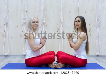 Young attractive girls do yoga. Dream and relax. Seriya. Portrait