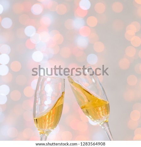 Glasses of champagne with festive background. Empty copy space for your text. Valentine day concept