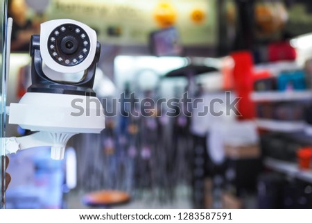Security camera in the shopping mall center. IP Camera.