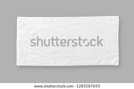 White cotton towel mock up template fabric wiper isolated on grey background with clipping path, flat lay top view  Royalty-Free Stock Photo #1283587693