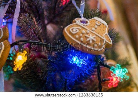 Christmas holiday decor - garland with gingerbread cookie. Holiday, celebration and new year concept