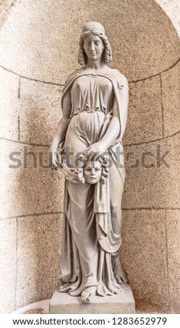 Ancient sculpture - an allegorical figure of the muse of Theater - Melpomene  Royalty-Free Stock Photo #1283652979