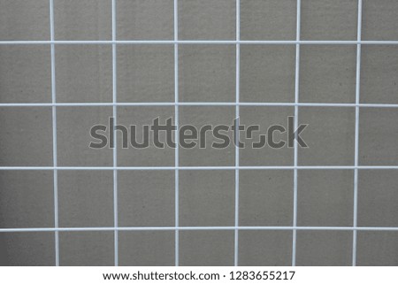 Cells on a brown background.