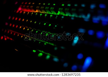 RGB Gaming mechanical Keyboard with nice bokeh on dark room