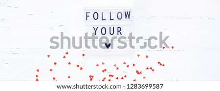 Creative Valentine Day romantic composition flat lay top view love holiday celebration with red heart lightbox white wooden background copy space Template greeting card text design social media blogs