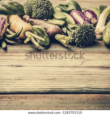 Fresh raw vegetables background Healthy food concept with copy space. Toned photo.