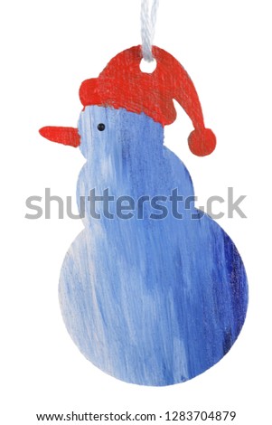 Homemade Christmas Snow Man l made of wood and painted with acrylic paints. Isolated on white macro studio shot