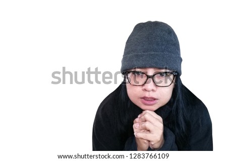 Woman feeling cold in the winter isolated on white background. 