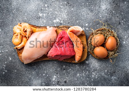 Beef and chicken meat, fish and shrimps. Animal protein food sources Royalty-Free Stock Photo #1283780284