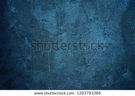 Dark blue concrete wall as background
