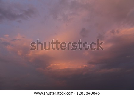 Abstract natural background with clouds. Beautiful sky with clouds  during sunrise or sunset. 