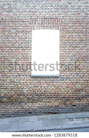 Mock up. Blank vertical billboard, poster frame, advertising board on the brick wall