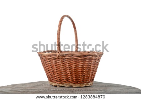 Empty wicker basket on a white background