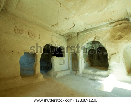 Old stone room in Cappadocia, Turkey. Ancient interior inside rock formations.
