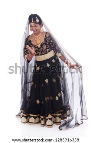 Indian lady performing cultural dance Mujra
