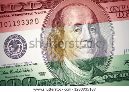 colorful flag of kurdistan on a american dollar money background