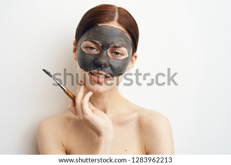 woman with clay mask portrait