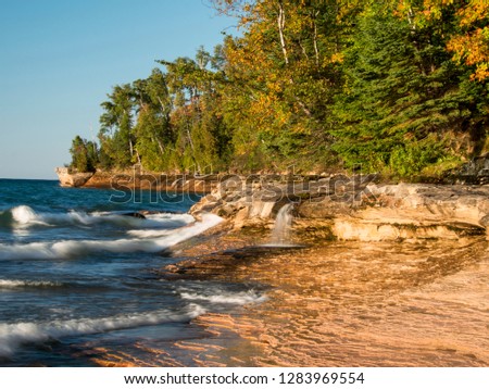 USA, Michigan, Upper Peninsula. Small waterfall along the edge of Lake Superior, Pictured Rocks National Seashore.