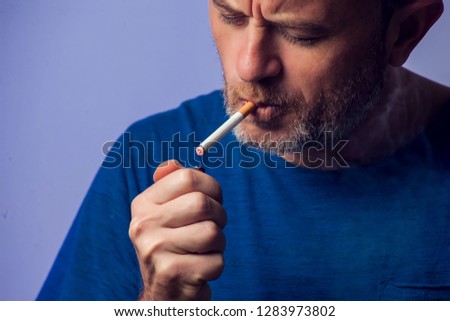 Close up of Man smoking cigarette. People, healt care concept