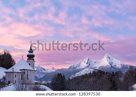 Watzmann at sunrise with church, Bavaria, Berchtesgaden, Germany Alps Royalty-Free Stock Photo #128397530