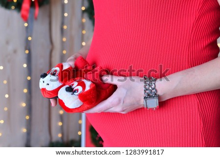 Beautiful pregnant woman in the red, European, White, Caucasian