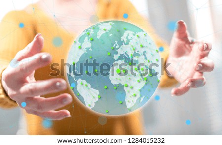 Global network concept between hands of a woman in background