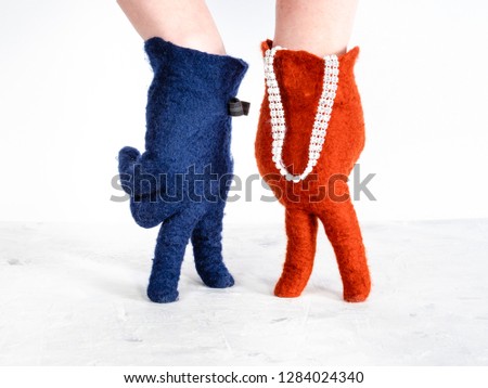 finger walking - hands in color felted gloves show speaking lady and gentleman on white background