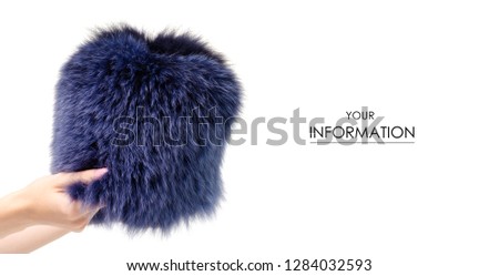 Fox fur hat in hand on white background isolation