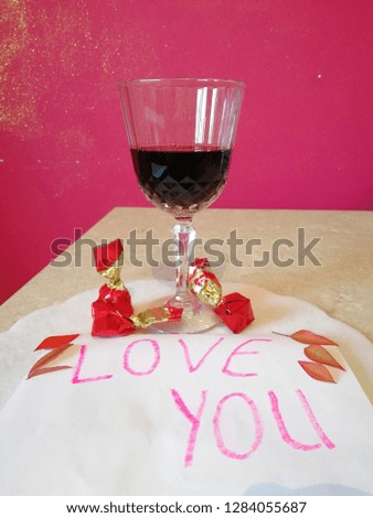red wine, caramel and Love You on paper