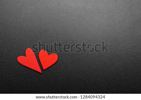 The red Heart shapes on black background in love concept for valentine's day with sweet and romantic moment