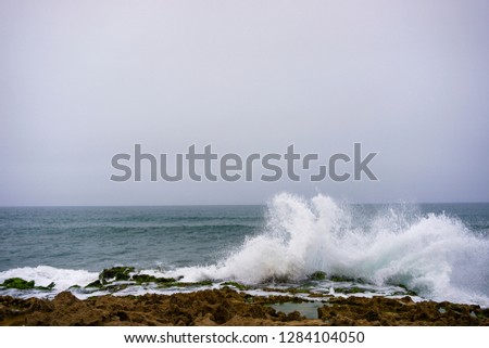 splashing water over the atlantic ocean. Agadir,Morocco.