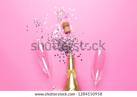 concept of opening an expensive golden champagne bottle dedicated to the celebration.