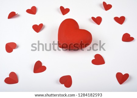 Big red heart on white background many paper hearts. Valentines Day.