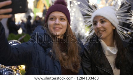 Two girls on Christmas shopping in New York
