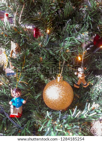 Close up view of gold ball on the christmas tree