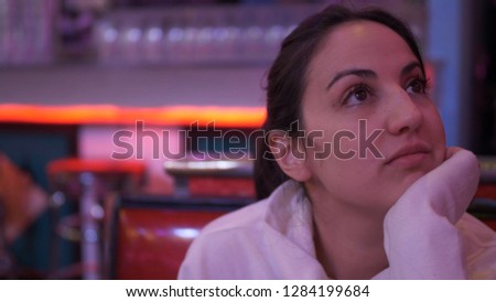 Young woman in an American Diner