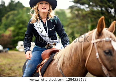 Award-winning young adult rider on her horse.