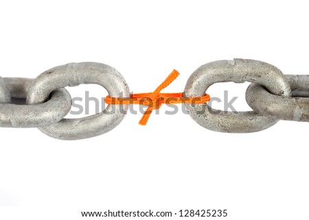 Weakest link. Chain tied by orange rope. Royalty-Free Stock Photo #128425235