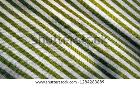 Simple diagonal striped fabric material background photo