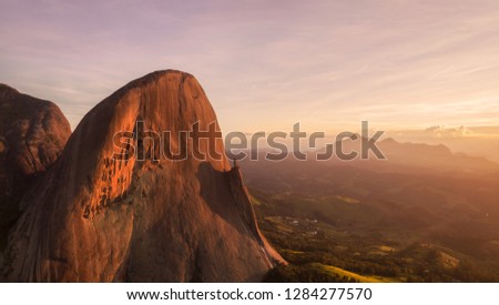 Aerial view of Pedra Azul (Blue Rock) on the foreground and the Forno Grande mountain in the background. Domingos Martins, Espirito Santo, Brazil.