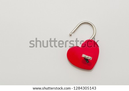 Heart shaped red lock with key. Concept of love forever with padlock 