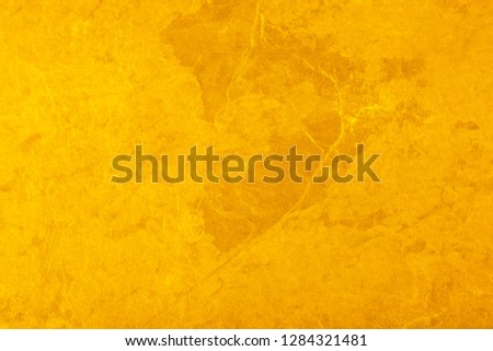 gold color wall for background.