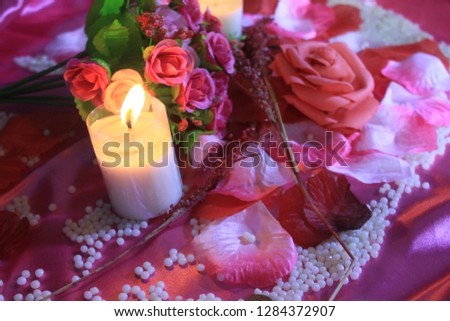Concept decoration Valentine day with bouquet and candle burning