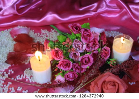 Photoshoot of bouquet, candle bunring and decoration Valentine day