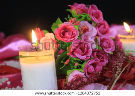 Candle burning with bouquet for photoshoot Valentine day