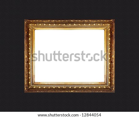 golden frame with blank space on black textured wall
