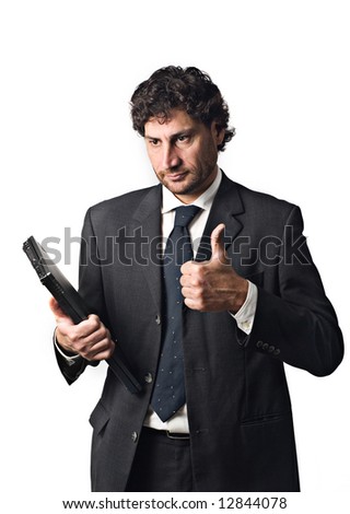 businessman with laptop, happy thumbs up