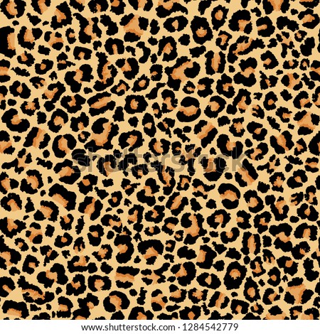 Leopard pattern. Seamless vector print. Realistic animal texture. Black and yellow spots on a beige background. Abstract repeating pattern - leopard skin imitation can be painted on clothes or fabric. Royalty-Free Stock Photo #1284542779