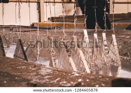 Galvanization or galvanizing is the process of applying a protective zinc coating to steel or iron, to prevent rusting. Royalty-Free Stock Photo #1284605878