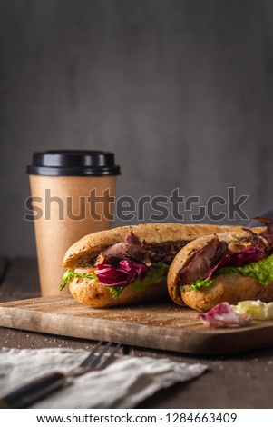 Tasty sandwich with roast beef Royalty-Free Stock Photo #1284663409